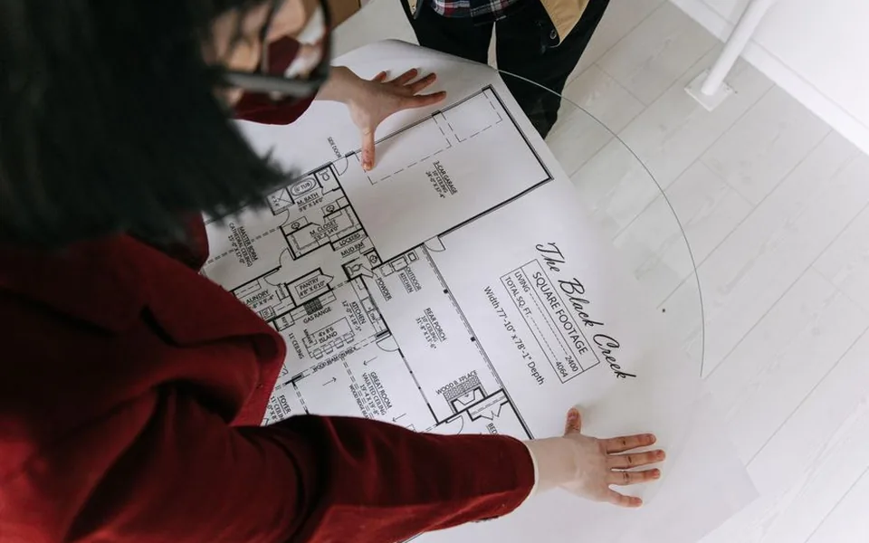 Property floor plan being reviewed during an inspection