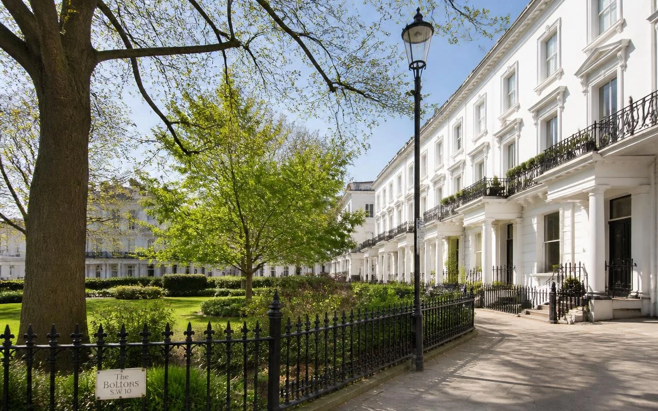 White stucco Victorian terraced houses on a quiet street in west London